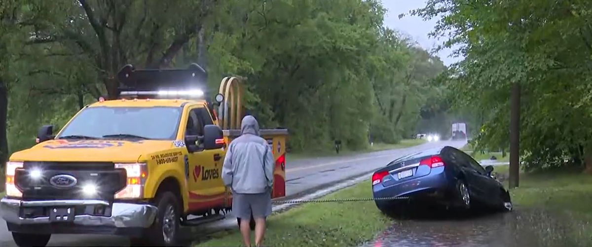 <i>WALA via CNN Newsource</i><br/>A driver was rescued from a water ditch in Theodore