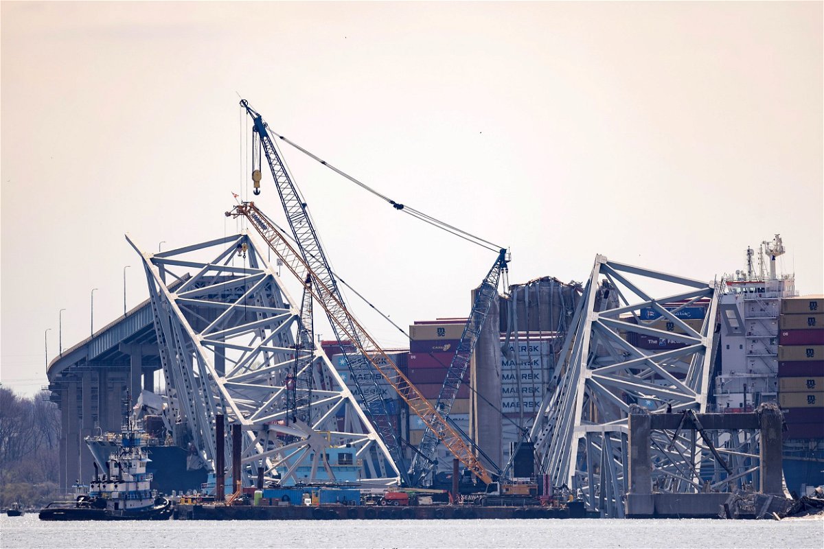 <i>Tasos Katopodis/Getty Images via CNN Newsource</i><br/>Debris is cleared from the collapsed Francis Scott Key Bridge as efforts begin to reopen the Port of Baltimore on March 31.