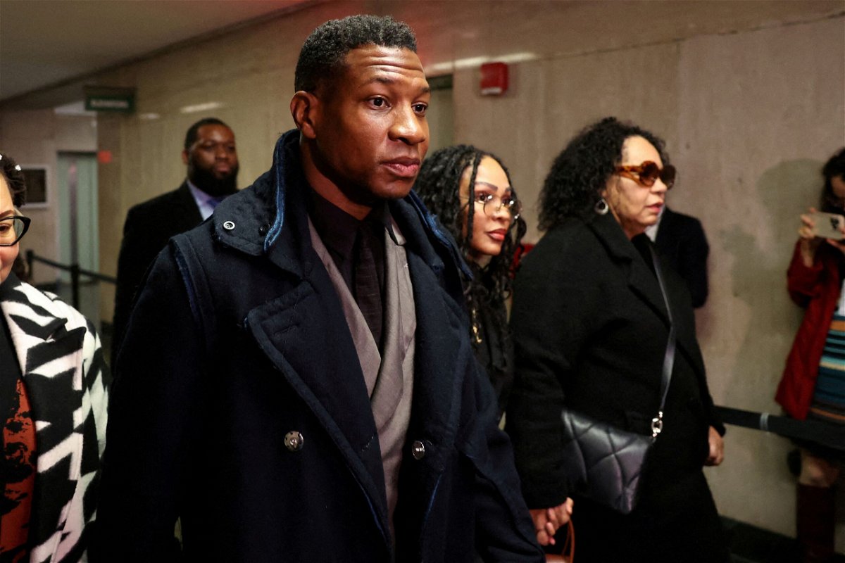 <i>Shannon Stapleton/Reuters via CNN Newsource</i><br/>Actor Jonathan Majors arrives with Meagan Good for the jury selection in his assault and harassment case at Manhattan Criminal Court in New York City on December 18