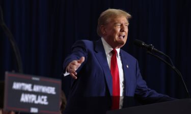 Former President Donald Trump speaks to guests at a rally on April 2