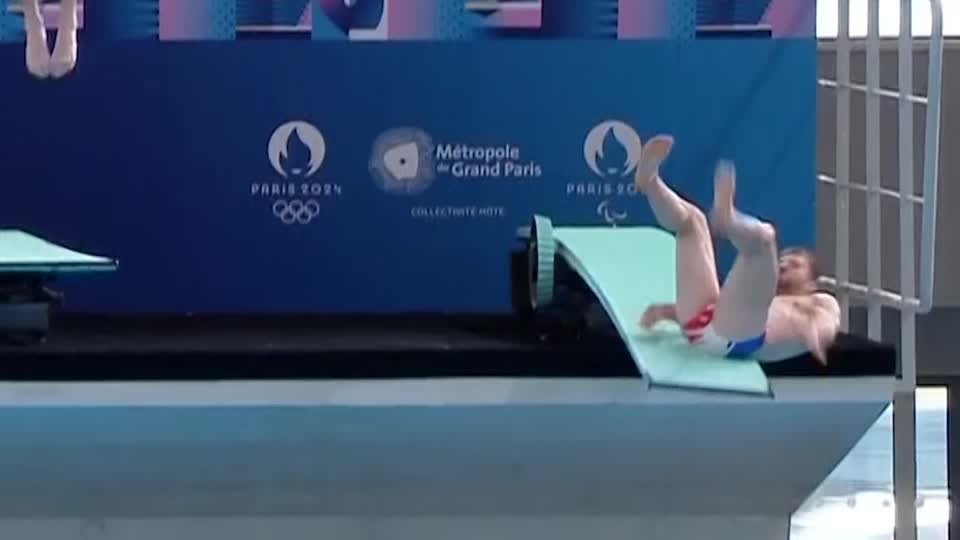 <i>Reuters via CNN Newsource</i><br/>Alexis Jandard fell off the diving board at the inaugaration of the Olympic pool.