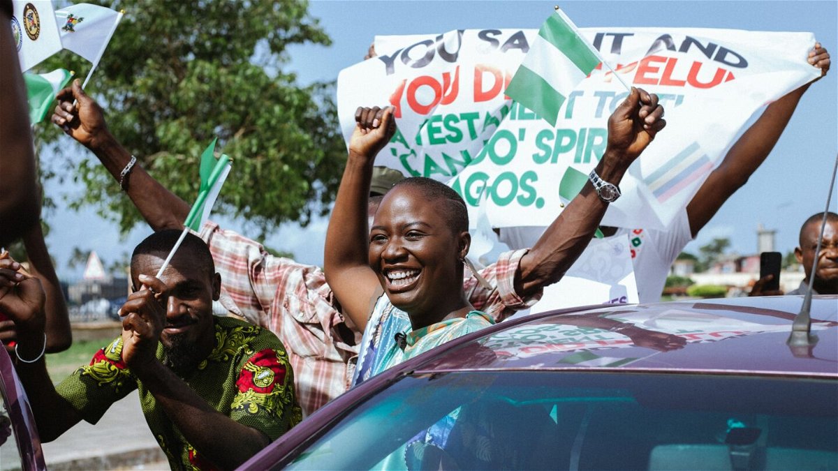 The 29-year-old arrived to a hero's welcome in Lagos.