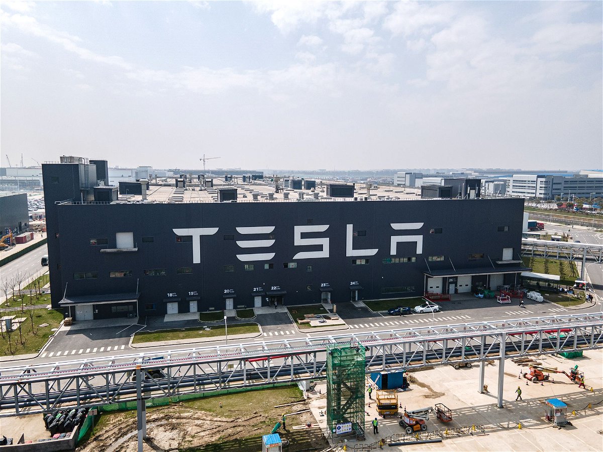 <i>Xiaolu Chu/Getty Images via CNN Newsource</i><br/>An aerial view of Tesla Shanghai Gigafactory. Tesla plans to cut more than 10% of its staff worldwide