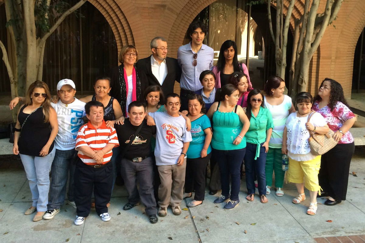 Professors Valter Longo (tallest in back) and Dr. Jaime Guevara-Aguirre (left of Longo) with people participating in their study on Laron syndrome. Nathaly Paola Castro Torres is standing in front of Professor Longo.