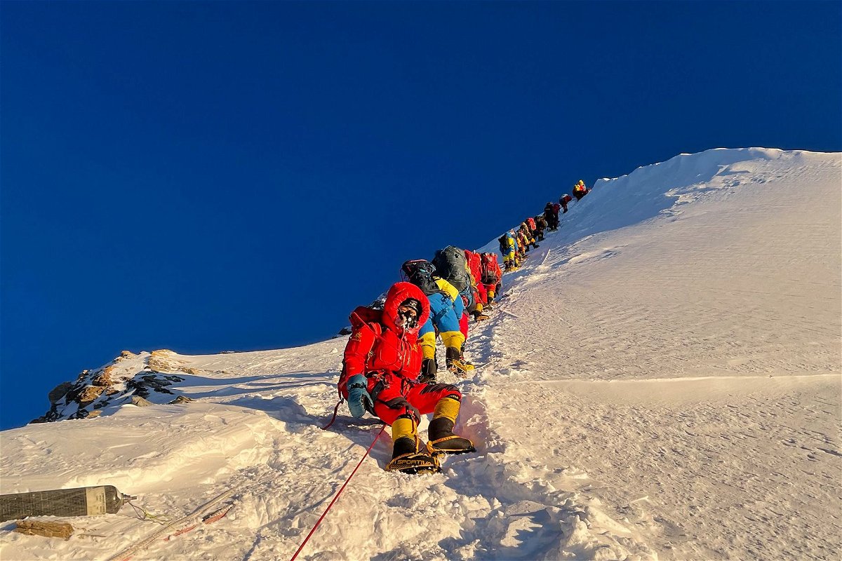 Mountaineers as they climb during their ascend to summit Mount Everest in May 2021.