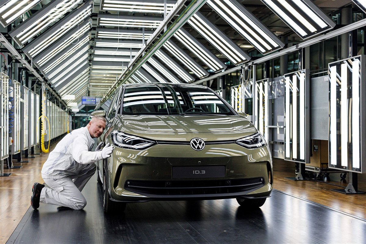 A VW employee presents the new Volkswagen ID.3, the carmaker's flagship electric passenger car, at its factory in Dresden, Germany, in March 2023. Europeans orders for EV's have surged in 2024.