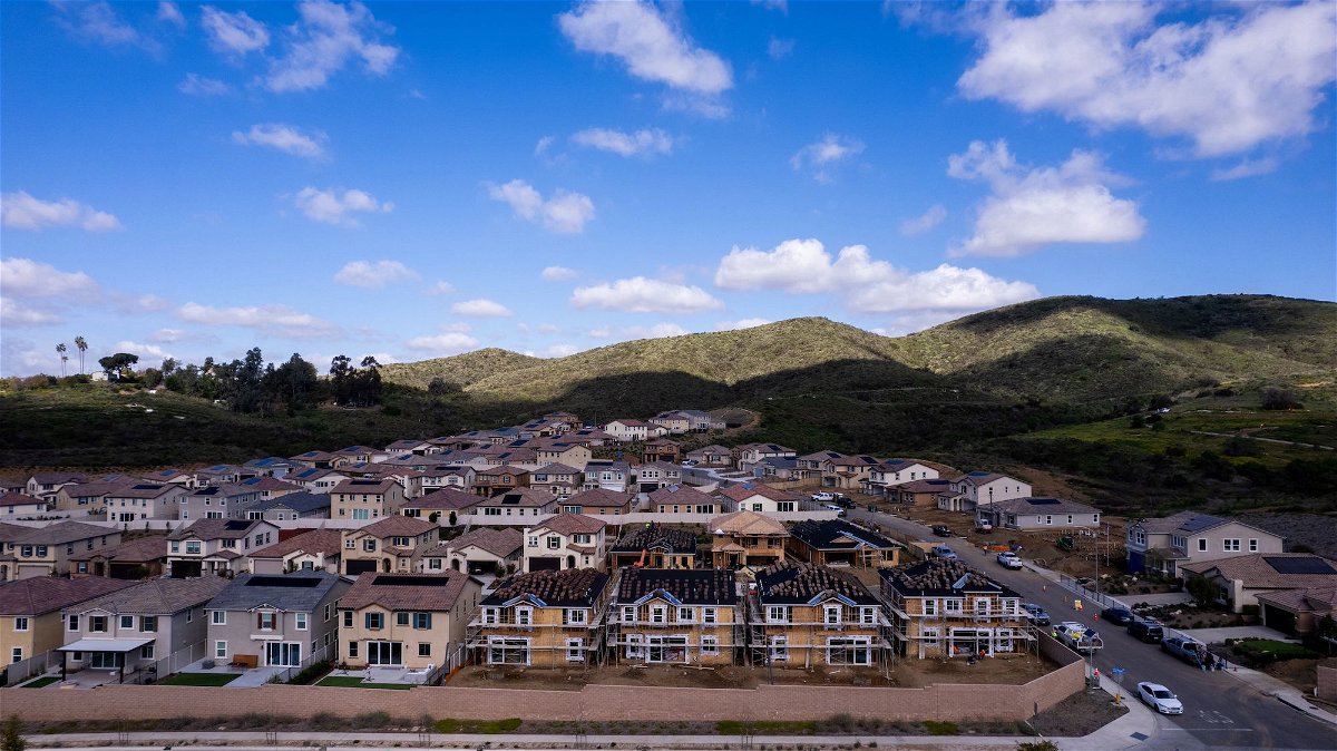 A drone view shows single-family homes at a new subdivision under construction in the rural hills of San Marcos, California, in March. US home-price growth accelerated in February at the fastest annual pace since November 2022.
