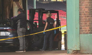 A car in the Gate C entrance to Fenway Park