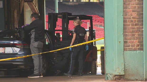 <i>WBZ via CNN Newsource</i><br/>A car in the Gate C entrance to Fenway Park