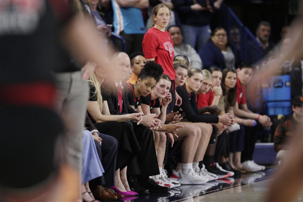 FILE - Players and staff on the Utah bench react toward the end of a second-round college basketball game against Gonzaga in the NCAA Tournament in Spokane, Wash., Monday, March 25, 2024. A northern Idaho prosecutor won't bring hate crime charges against an 18-year-old accused of shouting a racial slur at members of the Utah women's basketball team while the team was in Idaho to attend the NCAA Tournament.