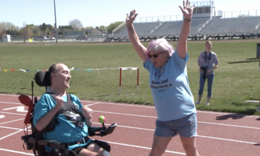 Cody Lax celebrates with Wendy Salazar at Special Olympics