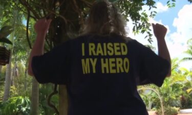 of Loxahatchee wears her "Proud U.S. Navy Mom" T-shirt with pride