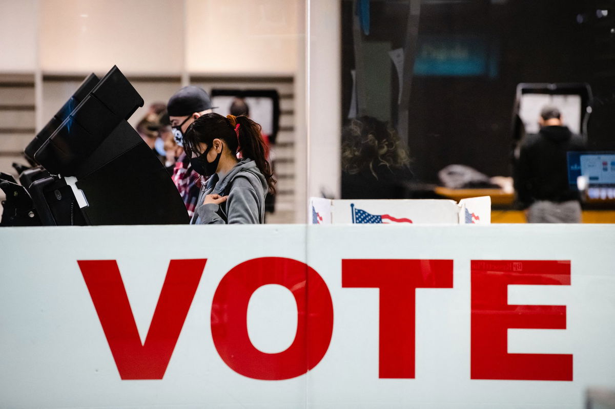 How the markets react in an election year are difficult to predict. A woman is shown here casting her ballot in the 2020 general election inside the Basset Place Mall in El Paso, Texas, on November 3, 2020.