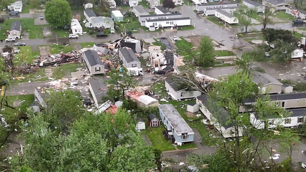 Debris is seen at a damaged FedEx facility after a tornado in Portage