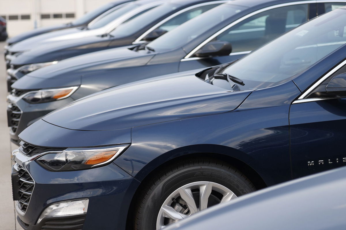 Unsold 2020 Malibu sedans sit at a Chevrolet dealership late Sunday, Aug. 9, 2020, in Englewood, Colorado.