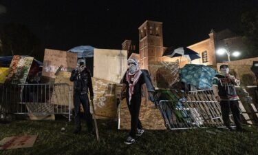 Counter protesters attack a pro-Palestinian encampment set up on the campus of the University of California Los Angeles (UCLA) as clashes erupt