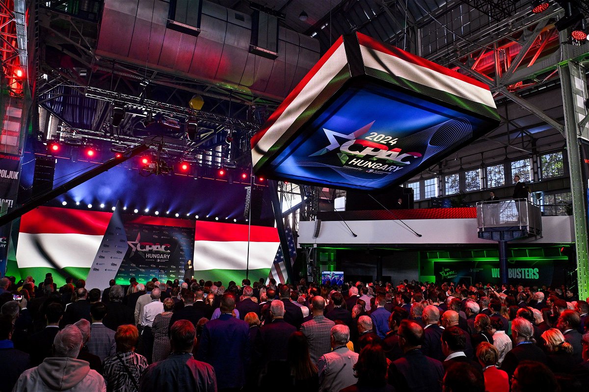 Participants sing the national anthem during the opening ceremony for the third Hungarian edition of the Conservative Political Action Conference in Budapest.