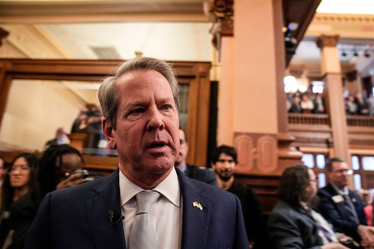 <i>Brynn Anderson/AP via CNN Newsource</i><br/>Gov. Brian Kemp departs the House chamber after delivering the State of the State speech