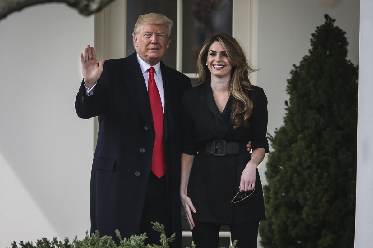<i>Oliver Contreras/SIPA USA/AP via CNN Newsource</i><br/>Then-President Donald Trump stands next to Hope Hicks in 2018