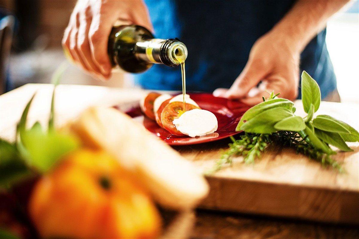 Olive oil can be a healthy, tasty addition to foods such as sandwiches and salads.
