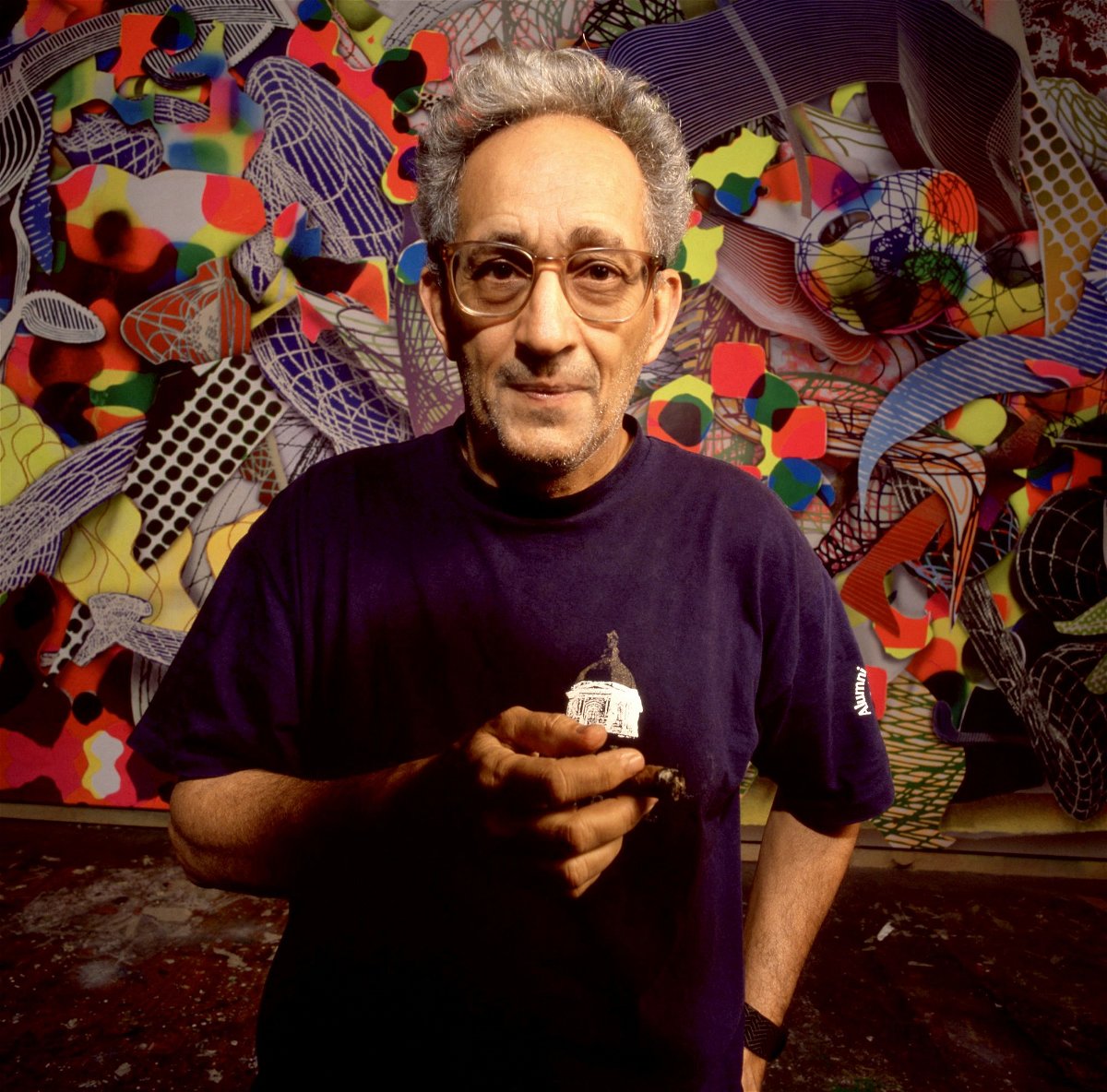 American artist Frank Stella poses for a portrait at his studio in New York in May 1995. Stella, the American artist renowned for his abstract works, died at the age of 87, his longtime representative said in a statement.