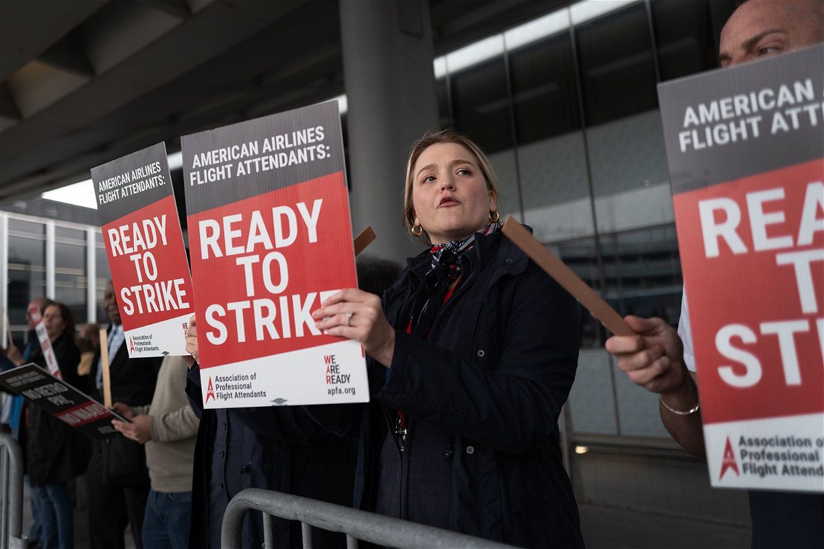 American Airlines flight attendants picket outside O’Hare International Airport to demand higher wages on May 9 in Chicago, Illinois. America's cost of living crisis has stung new flight attendants.
