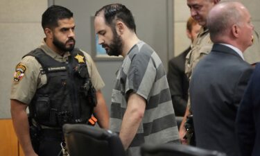 Daniel Perry returns to his chair after being sentenced to 25 years for the murder of Garrett Foster at the Blackwell-Thurman Criminal Justice Center in Austin