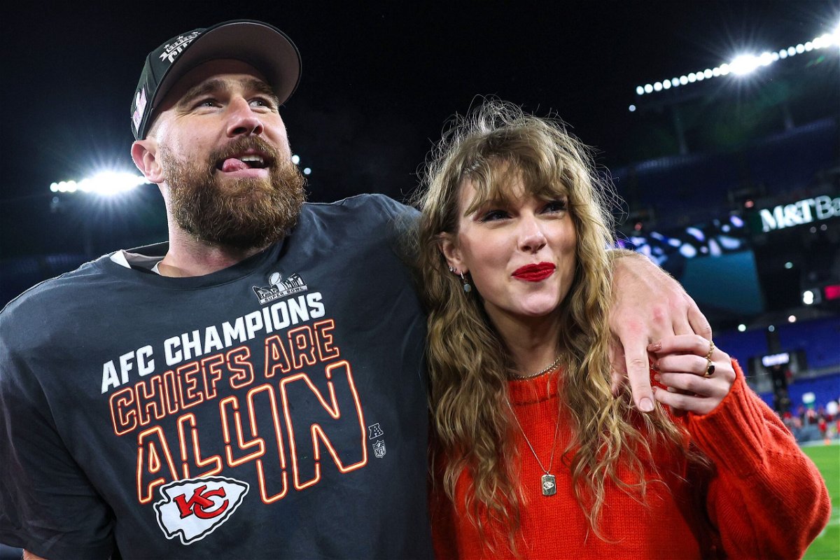 Travis Kelce and Taylor Swift are seen here in January. Kelce recently revealed his favorite Swift era.
