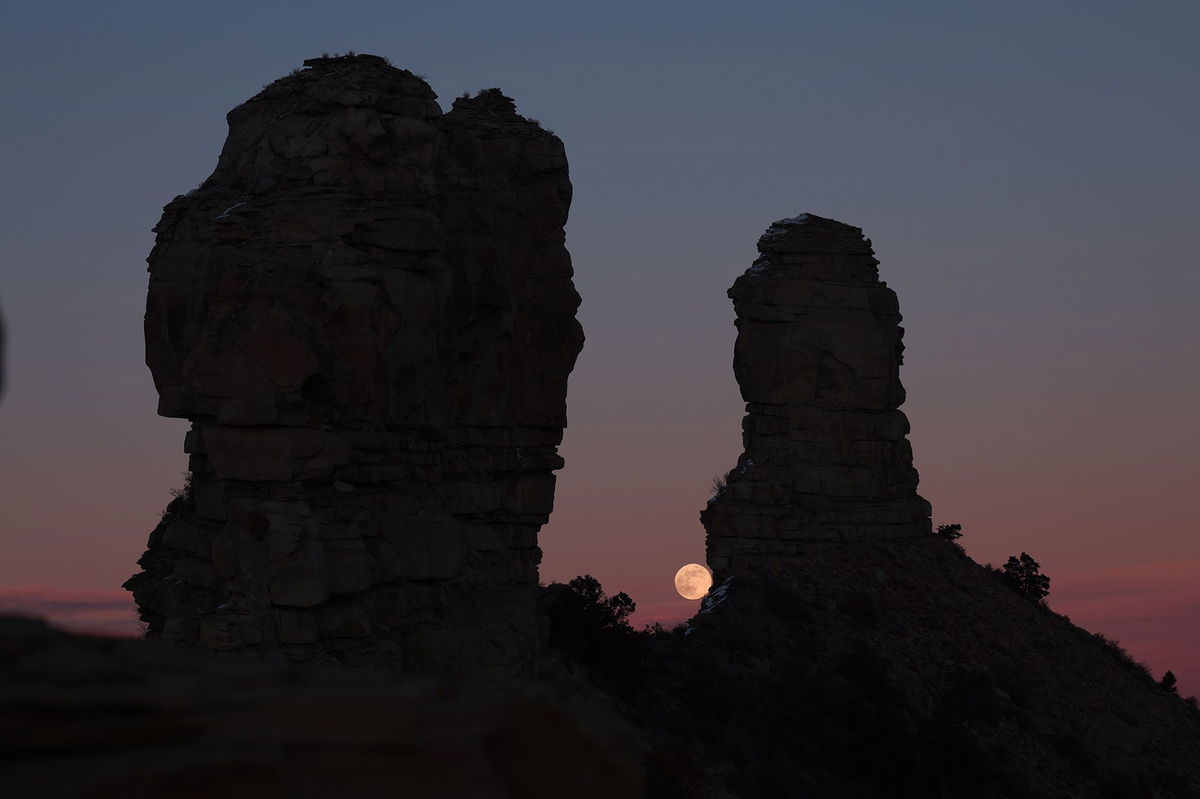 Researchers are investigating lunar alignments at Chimney Rock, Colorado, shown here at full moonrise in December 2023.