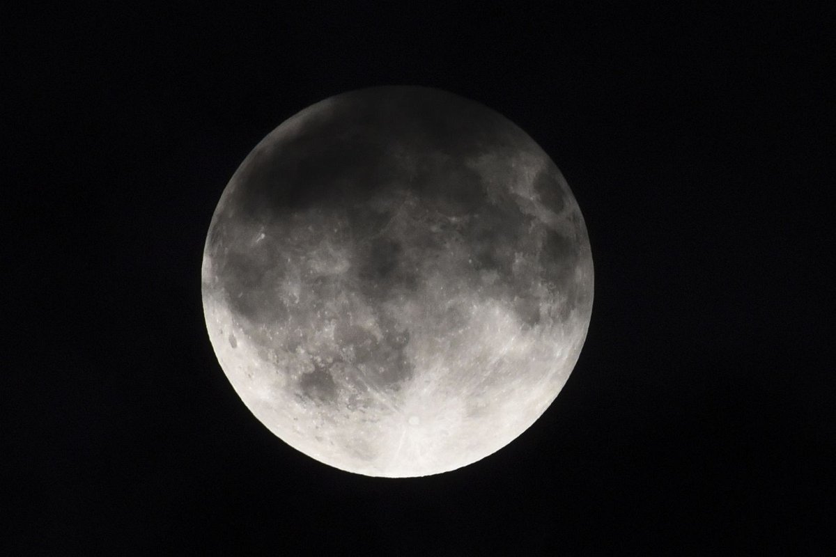 May's full moon is known as the flower moon for its appearance in spring, when flowering plants bloom. In 2023, the full flower moon coincided with a lunar eclipse, as seen here from Kolkata, West Bengal, India.