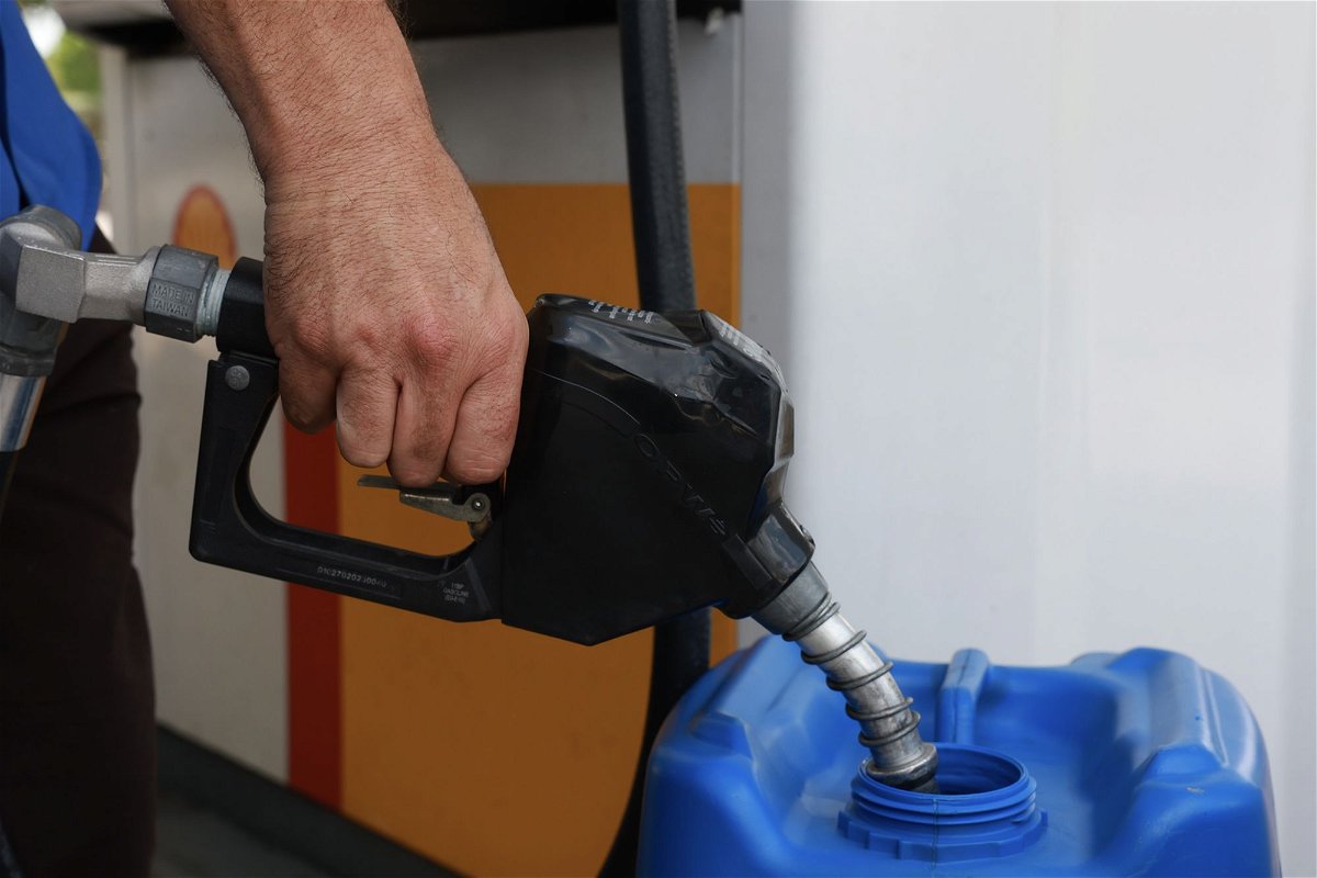 Julian Jemenez gets gas at a Shell station on May 15, in Miami. Drivers have seen the price of regular gas fall about 6 cents since last month. The national average Thursday was $3.61, according to AAA.