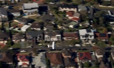 The Cessna plane skimmed across homes and treetops in Sydney's southwest suburb.