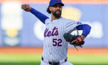 Jorge López throws a pitch during the 10th inning of the New York Mets' game against the Los Angeles Dodgers on May 28. López threw his glove into the crowd following his ejection from a game against the Los Angeles Dodgers on Wednesday.