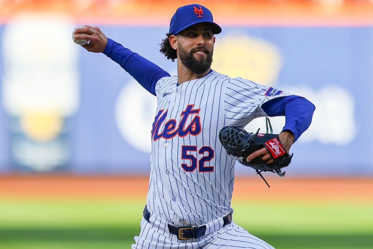 <i>Gordon Donovan/NURPHO/AP via CNN Newsource</i><br/>Jorge López throws a pitch during the 10th inning of the New York Mets' game against the Los Angeles Dodgers on May 28. López threw his glove into the crowd following his ejection from a game against the Los Angeles Dodgers on Wednesday.