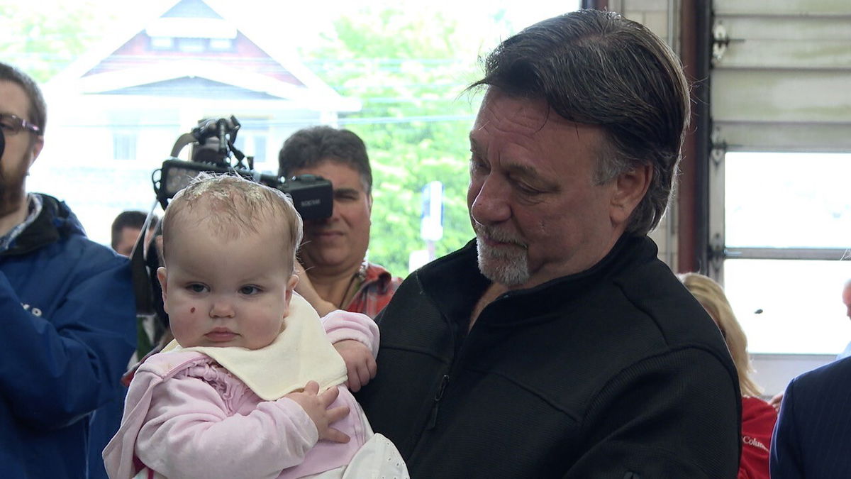 <i>WEWS via CNN Newsource</i><br/>John Stickovich reunites with 11-month-old Opal whom he pulled from a house fire on Monday