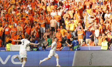 Austria earned an upset over the Netherlands to finish top of Group D.