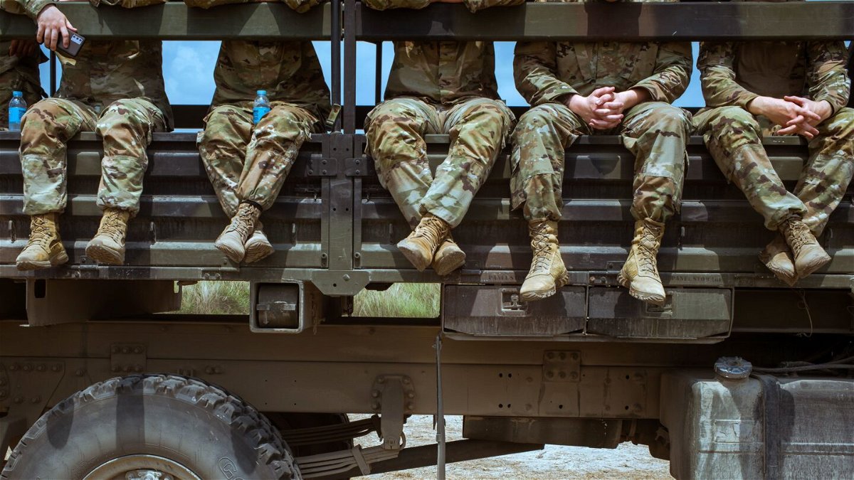 <i>Jes Aznar/Getty Images via CNN Newsource</i><br/>United States soldiers take a break as they prepare for a live fire drill to be presented to members of the media in April 2023 in San Antonio