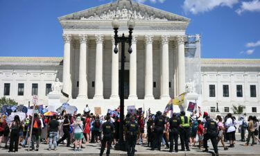 Reproductive rights activists demonstrate in front of the US Supreme Court on June 24.