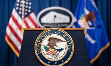 Seal of the US Department of Justice before a news conference in Washington