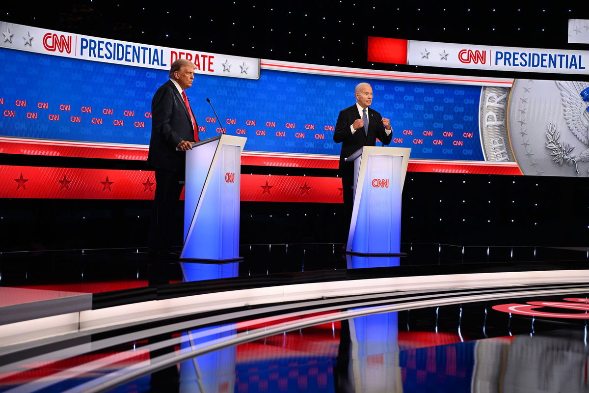 <i>Will Lanzoni/CNN via CNN Newsource</i><br/>Former President Donald Trump and President Joe Biden debate at CNN's Atlanta studios on June 27