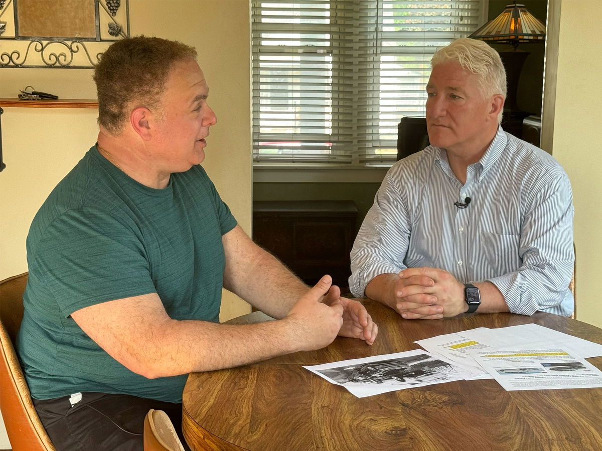 <i>CNN via CNN Newsource</i><br/>John King with UAW member Chris Vitale in St. Clair Shores