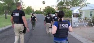 <i>U.S. Immigration and Customs Enforcement/WXYZ via CNN Newsource</i><br/>Agents from U.S. Immigration and Customs Enforcement staged offices for their University of Farmington