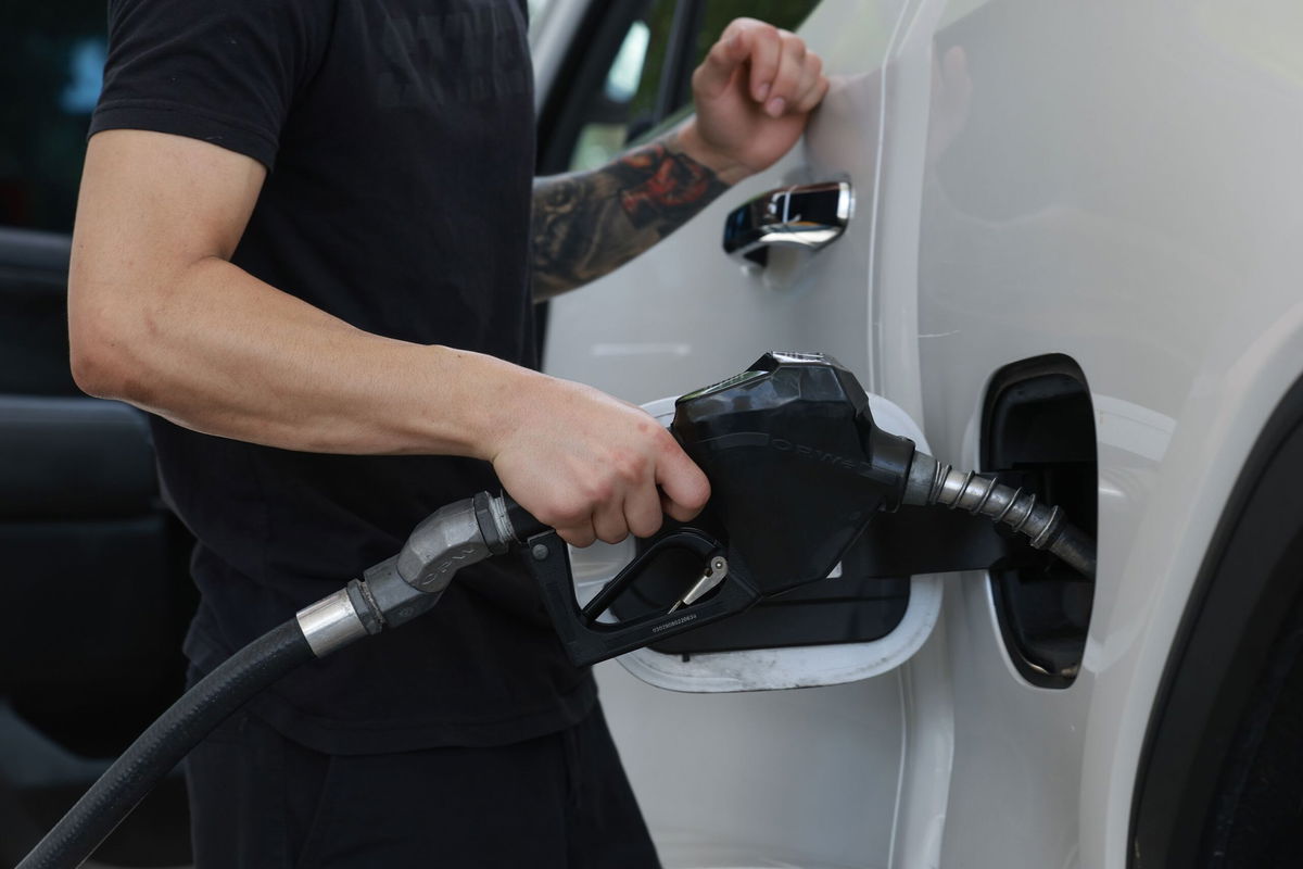 <i>Joe Raedle/Getty Images via CNN Newsource</i><br/>A customer gets gas at a Shell station on May 15 in Miami