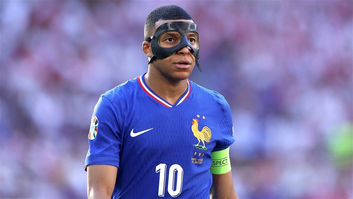 <i>Ina Fassbender/AFP/Getty Images via CNN Newsource</i><br/>Mbappé wore the mask against Poland.