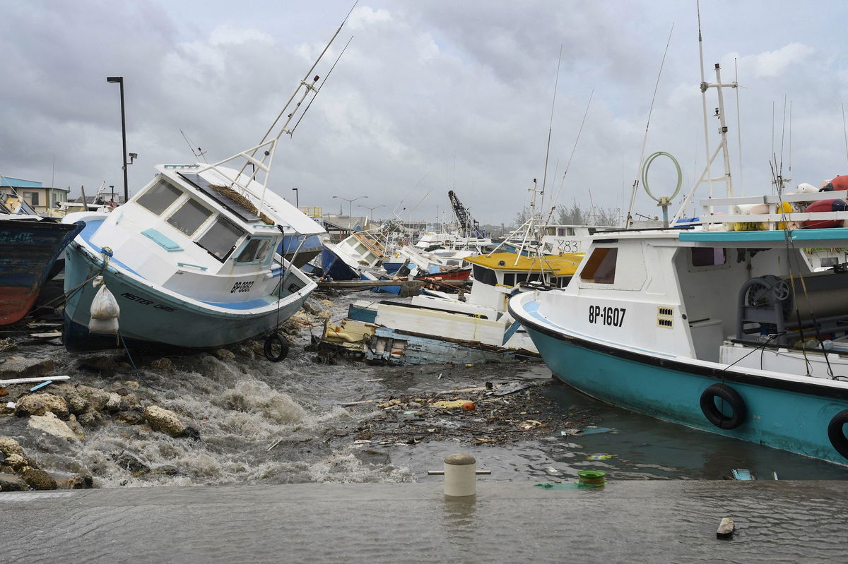 <i>Randy Brooks/AFP/Getty Images via CNN Newsource</i><br/>Damaged fishing boats rest on the shore after the passing of Hurricane Beryl at the Bridgetown Fish Market