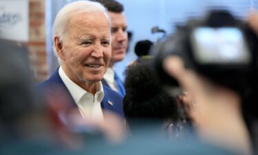 President Joe Biden greets volunteers at a campaign office in Philadelphia on Sunday