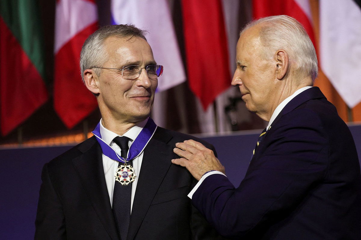 <i>Leah Millis/Reuters via CNN Newsource</i><br/>U.S. President Joe Biden awards NATO Secretary General Jens Stoltenberg with the Presidential Medal of Freedom at a NATO event to commemorate the 75th anniversary of the alliance