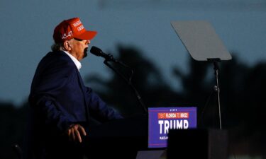 Former President Donald Trump speaks at a rally at his golf resort in Doral