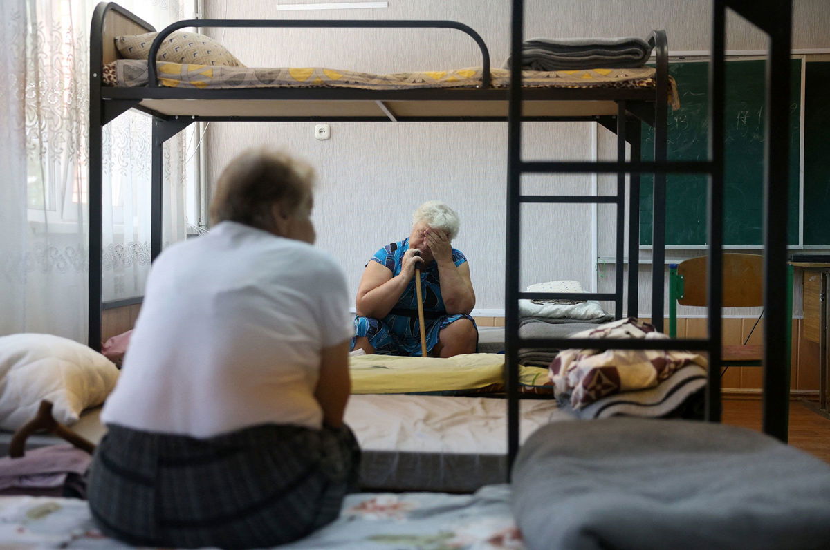 <i>Pablo Miranzo/Anadolu/Getty Images via CNN Newsource</i><br/>A Ukrainian soldier runs to a shelter in the Pokrovsk area of Ukraine on July 23.