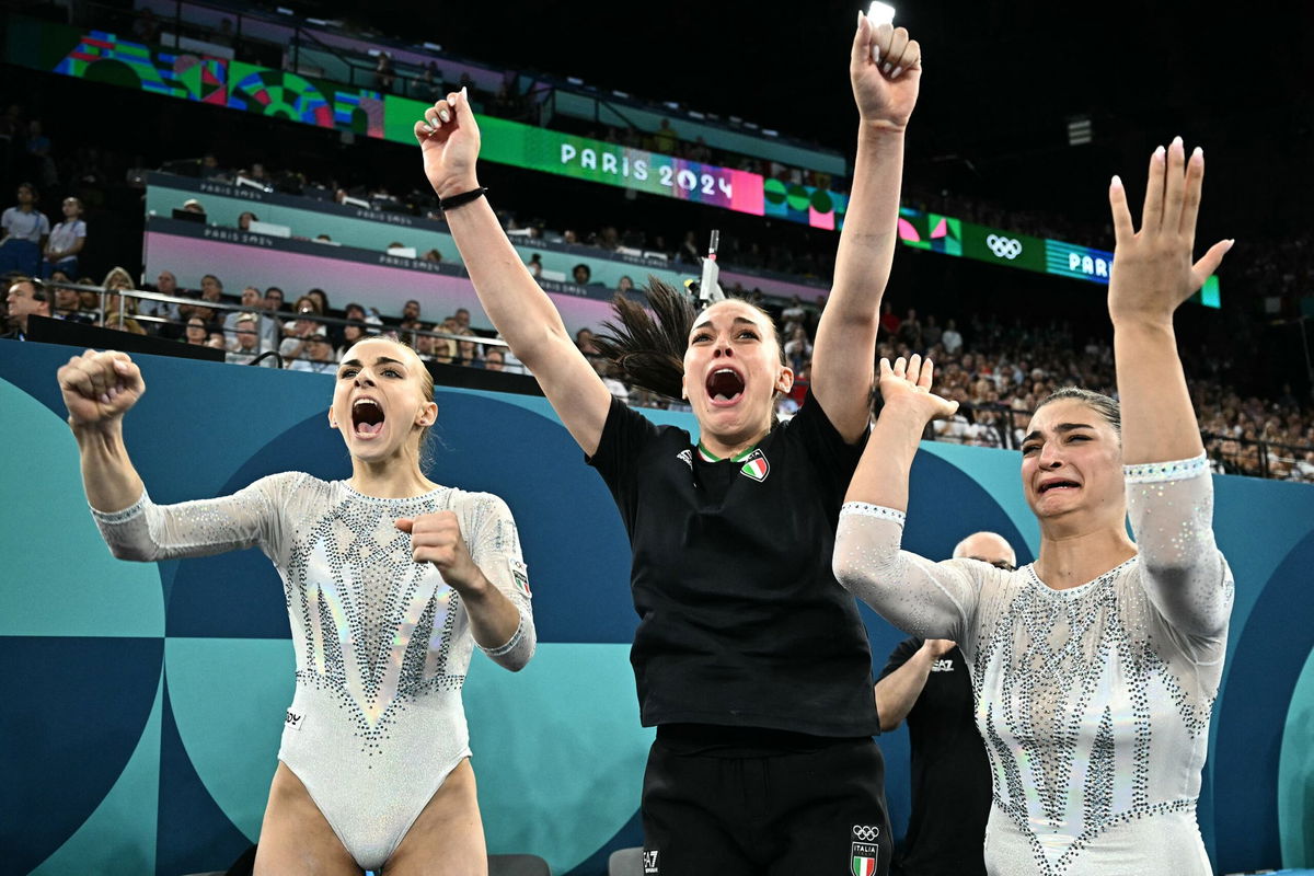 <i>Gabriel Bouys/AFP/Getty Images via CNN Newsource</i><br/>Alice D'Amato competes in the balance beam during the women's team event final.